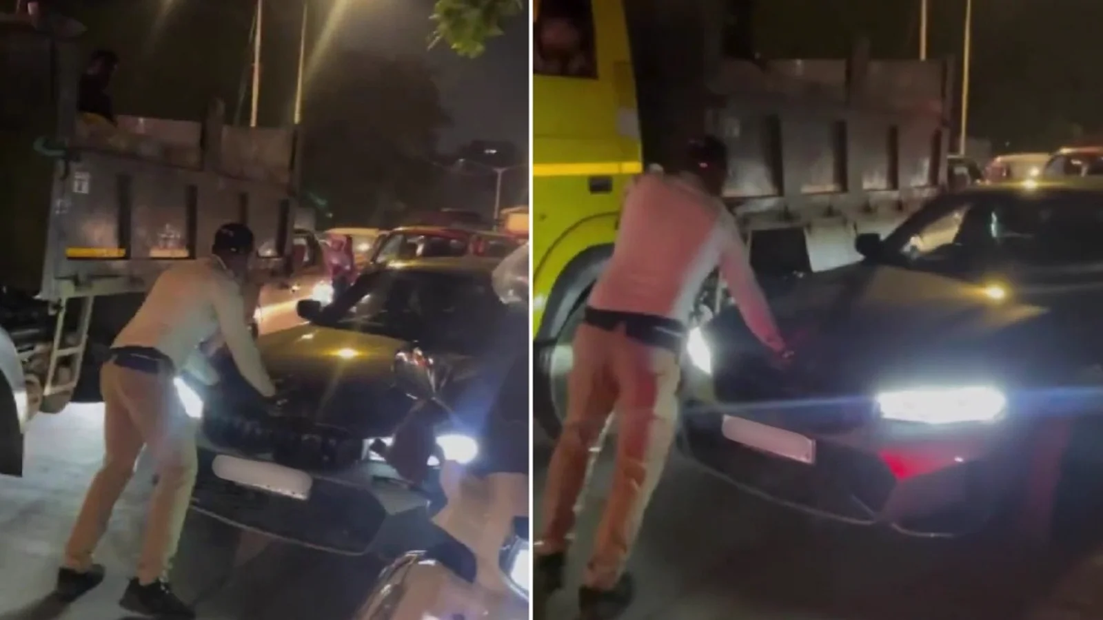 रात में मुंबई में एक कार के सामने खड़ा यातायात पुलिसकर्मी।