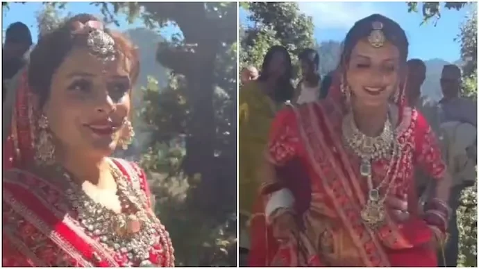 उत्तराखंड में दुल्हन के लहंगे में उंडावा गांव की ओर पैदल जातीं शर्मिला
